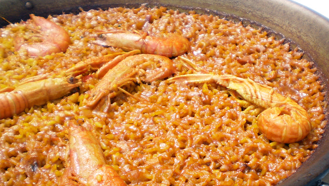 When talking about paella, what is the socarrat?