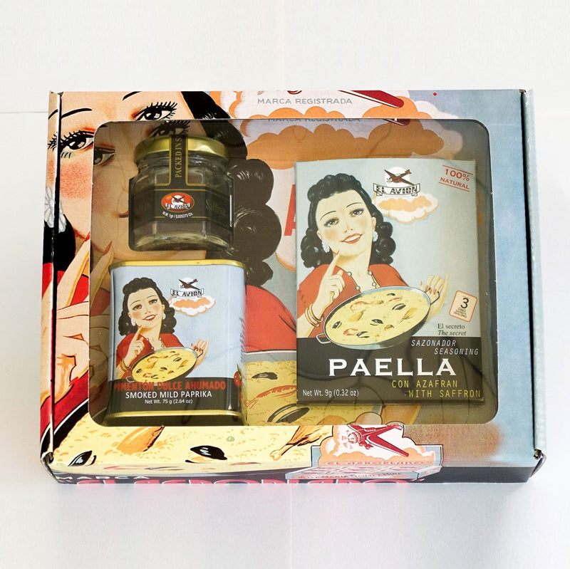 This gift pack includes one glass bottle with saffron strands, one box containing 3 sachets of paella mix, and a tin of sweet, smoky paprika. Saffron strands have been hand picked in La Mancha and will add aroma and enhance the taste of any dish. All-natural paella mix has no artificial coloring and obtains its yellow aspect from the spice turmeric. Its savory mix of spices adds a richness of flavor and a golden yellow color to paellas. Paprika adds fragrance, color and a slightly smoky flavor to dishes.