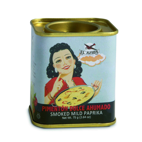 Smoked sweet paprika El Avion, from the region of Extremadura, follows a centuries-old process of drying, smoking with oak wood and grinding of the Ñora pepper. This deep red powdered spice adds fragrance, color and a slightly smoky flavor to dishes. Each tin has 75 grams.